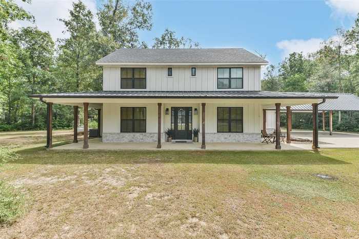 photo 1: 410 County Road 2254, Cleveland TX 77327