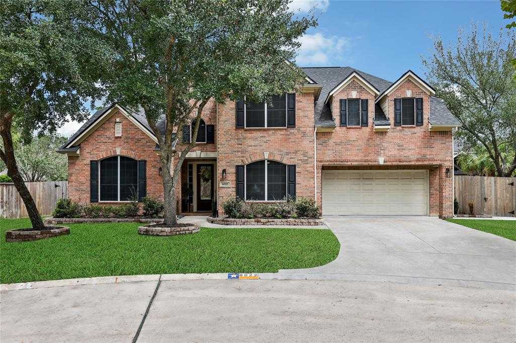 photo 1: 6022 Shady Alcove Court, Houston TX 77345