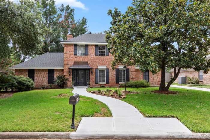 photo 1: 10911 Candlewood Drive, Houston TX 77042