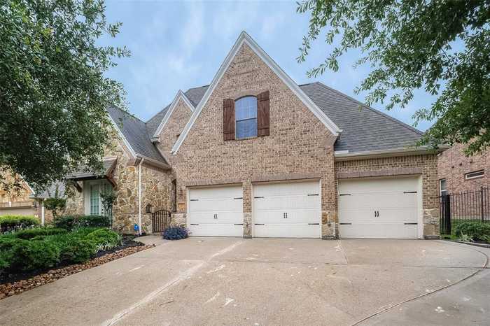 photo 1: 23 Woodmoor Place, The Woodlands TX 77354