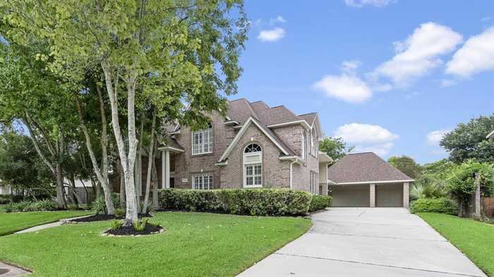 photo 1: 6119 Lark Valley Court, Kingwood TX 77345