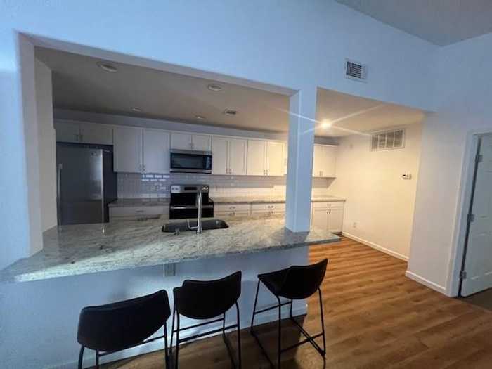 photo 2: 9707 Richmond Avenue Unit 102, Houston TX 77042