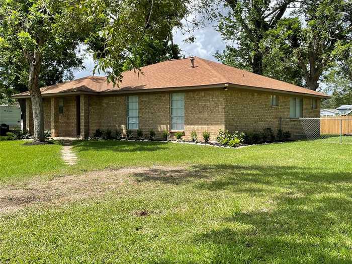 photo 1: 102 Cotton Street, Jones Creek TX 77541