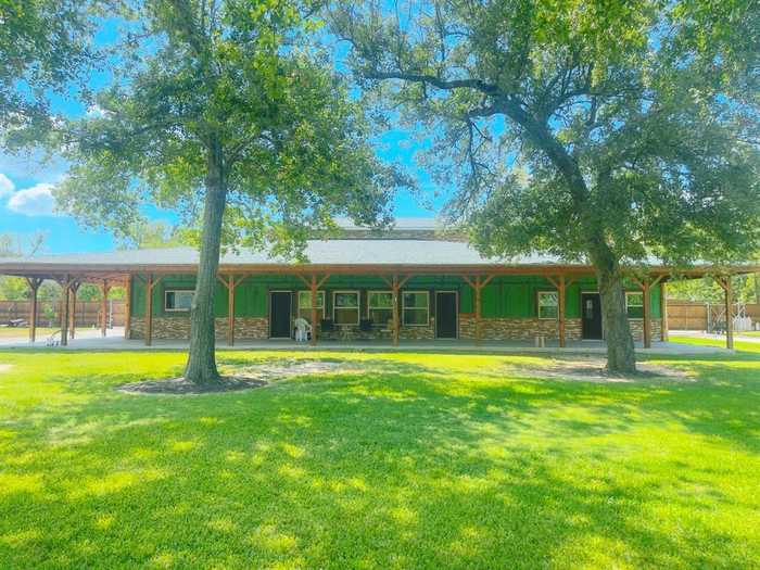 photo 1: 506 W Houston Street, Highlands TX 77562