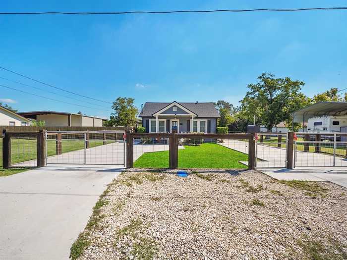 photo 1: 307 S 5th Street, Highlands TX 77562