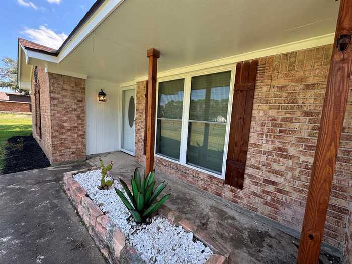 photo 1: 412 Elm Street, Hungerford TX 77448