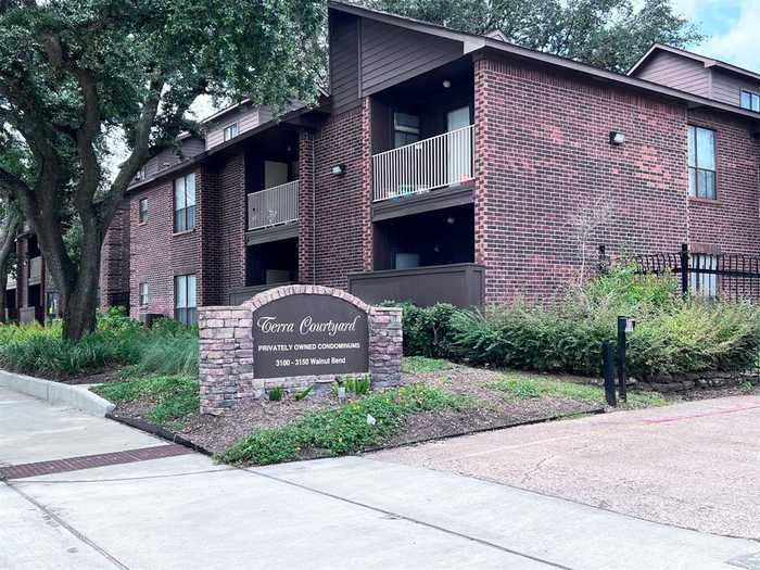 photo 1: 3130 Walnut Bend Lane Unit 401, Houston TX 77042