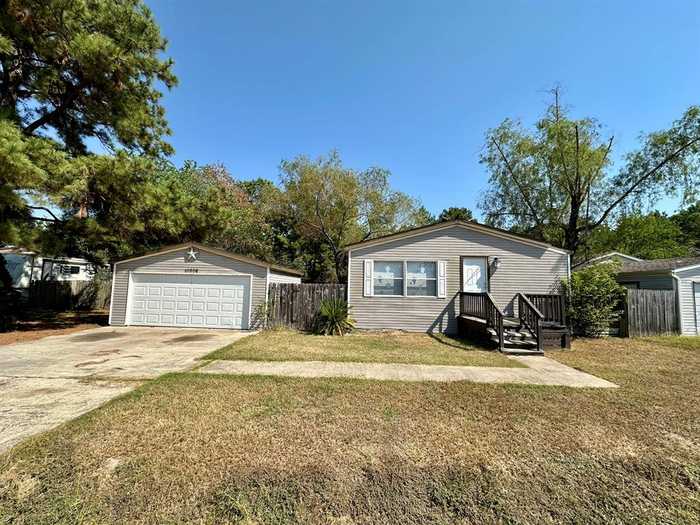 photo 1: 10906 Pine Desert Lane, Houston TX 77088