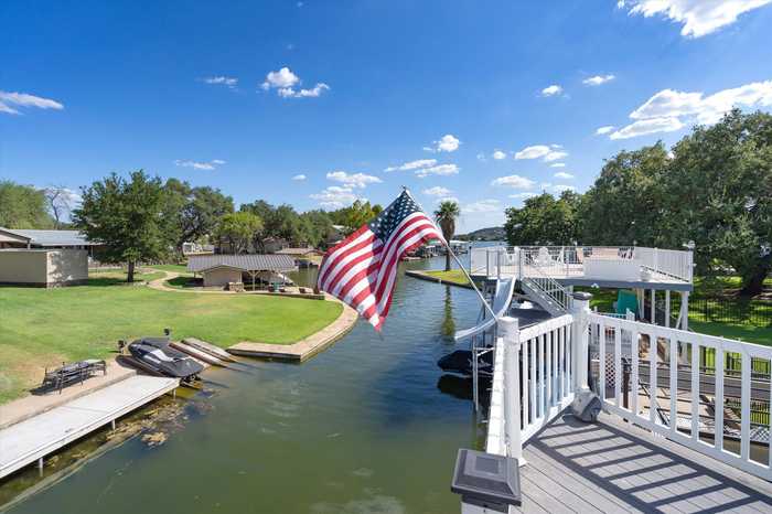 photo 1: 298 E Lakeshore Dr, Sunrise Beach TX 78643