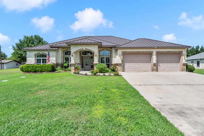 photo 1: 107 Redbird Street, Highland Haven TX 78654