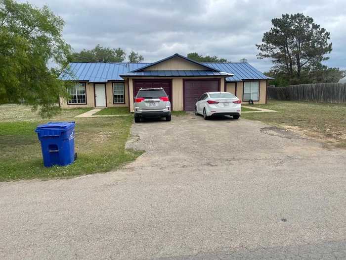 photo 1: 300-306 E South St, Camp Wood TX 78833