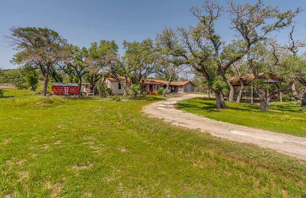 photo 1: 1349 Ranchero Rd, Kerrville TX 78028