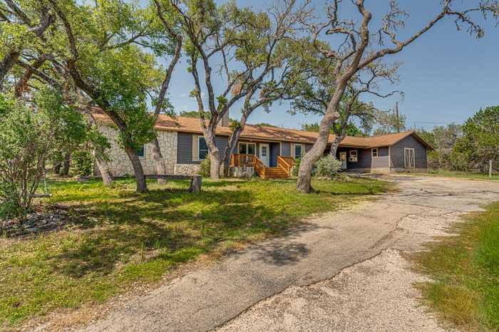 photo 1: 1349 Ranchero Rd, Kerrville TX 78028