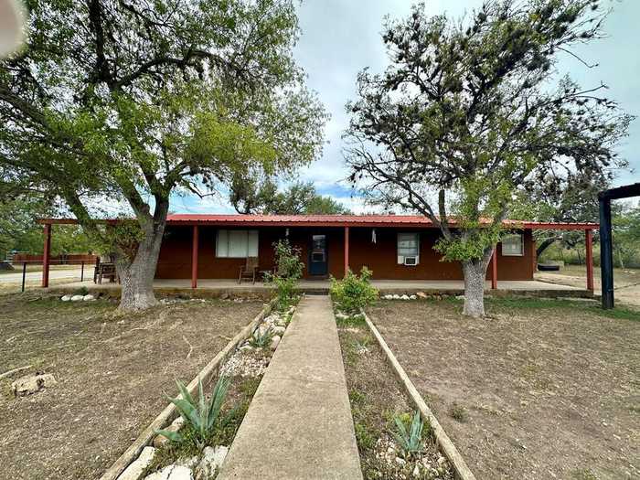 photo 1: 200 N Pecos, Camp Wood TX 78833