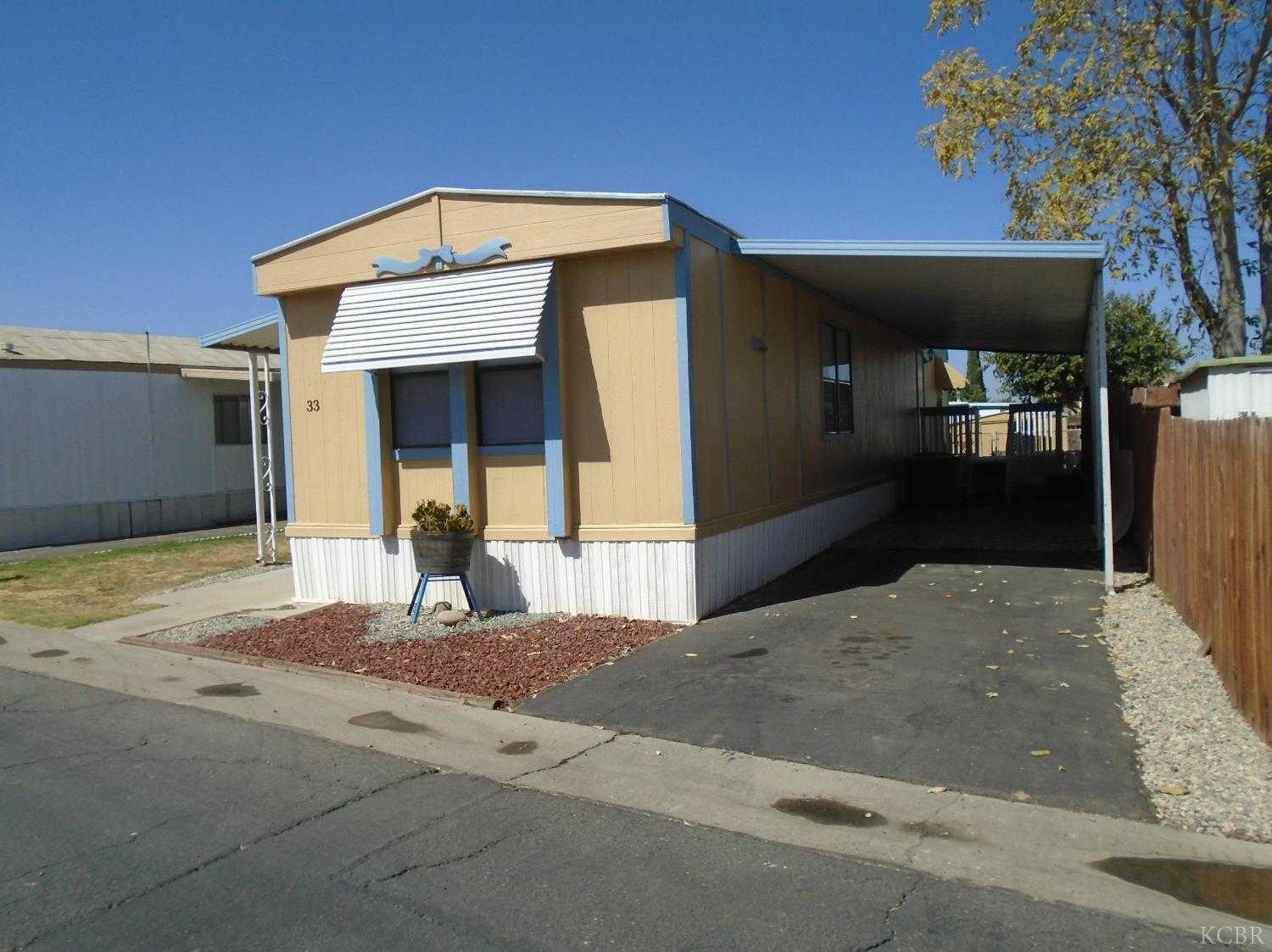 photo 1: 852 E Grangeville Boulevard, Hanford CA 93230