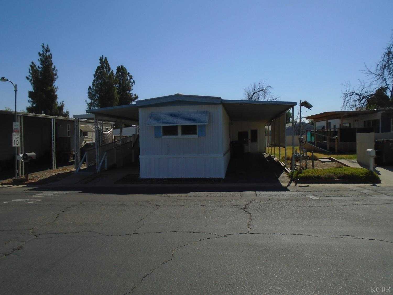 photo 1: 852 E Grangeville Boulevard, Hanford CA 93230