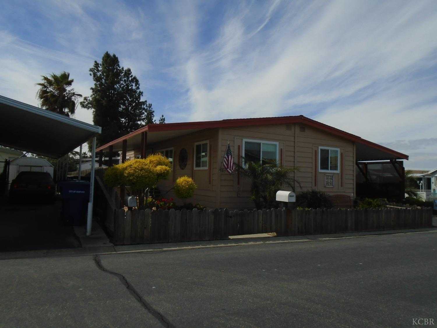 photo 1: 860 E Grangeville Boulevard, Hanford CA 93230