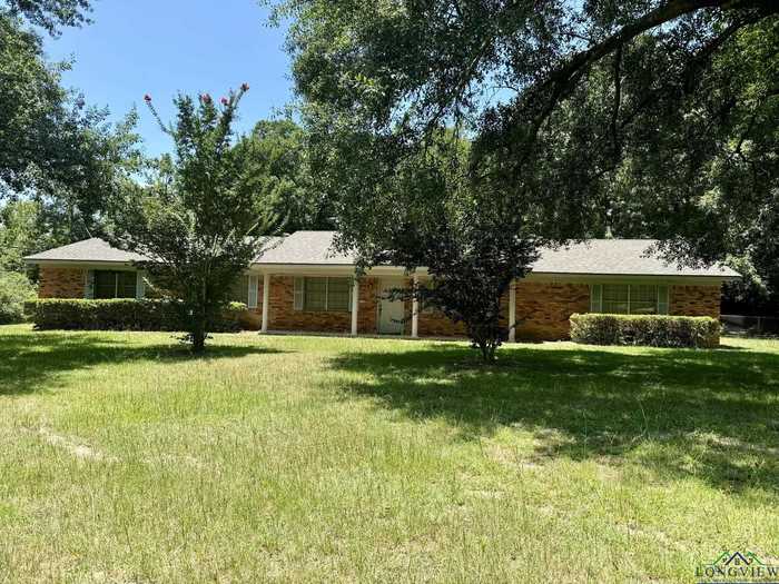 photo 1: 119 Flenniken St, Gladewater TX 75647