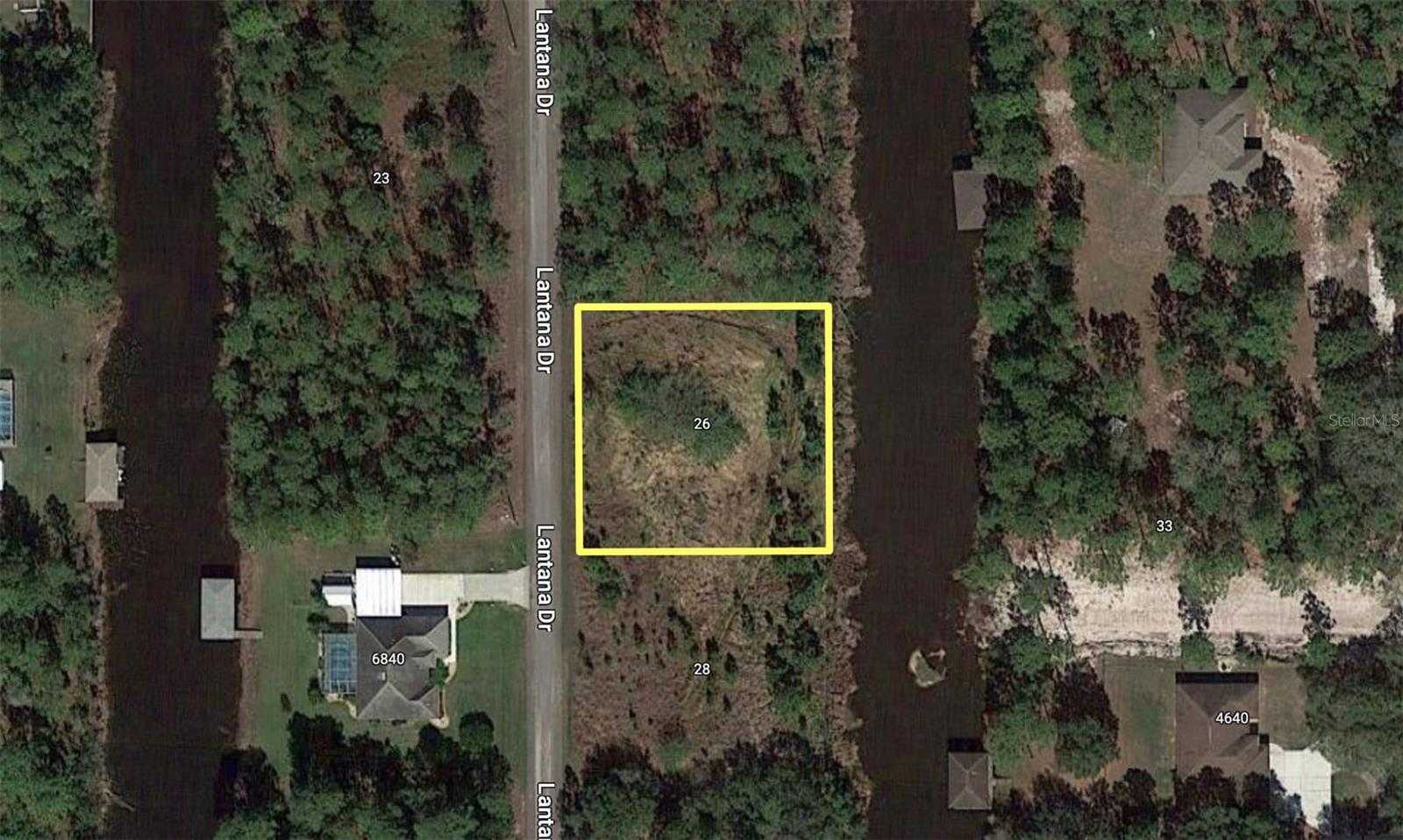 photo 1: 26 LANTANA DRIVE S, INDIAN LAKE ESTATES FL 33855