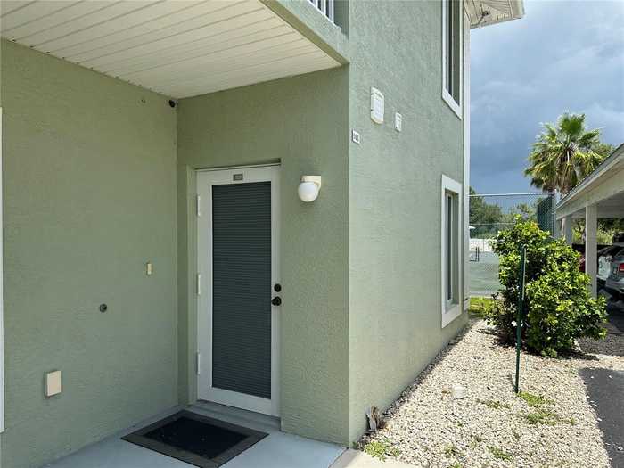 photo 1: 8050 MEMORY LANE Unit 101, ROTONDA WEST FL 33947