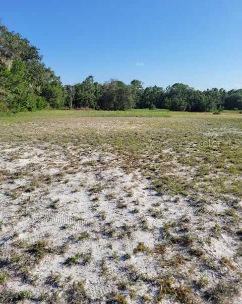 photo 3: 1850 SPRINGHEAD DRIVE, DELTONA FL 32725