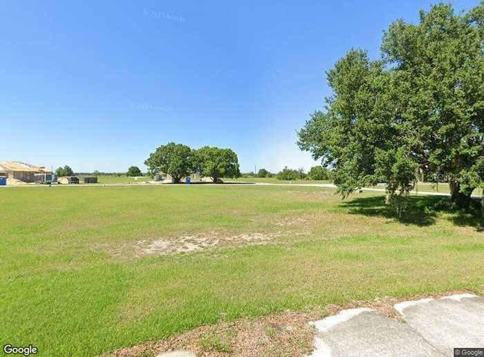 photo 3: 1209 GOLF COURT, SEBRING FL 33876