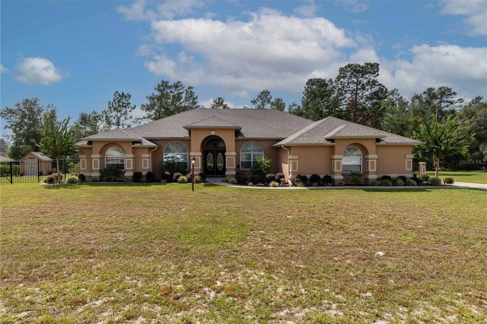 photo 1: 10411 SW 52ND COURT, OCALA FL 34476