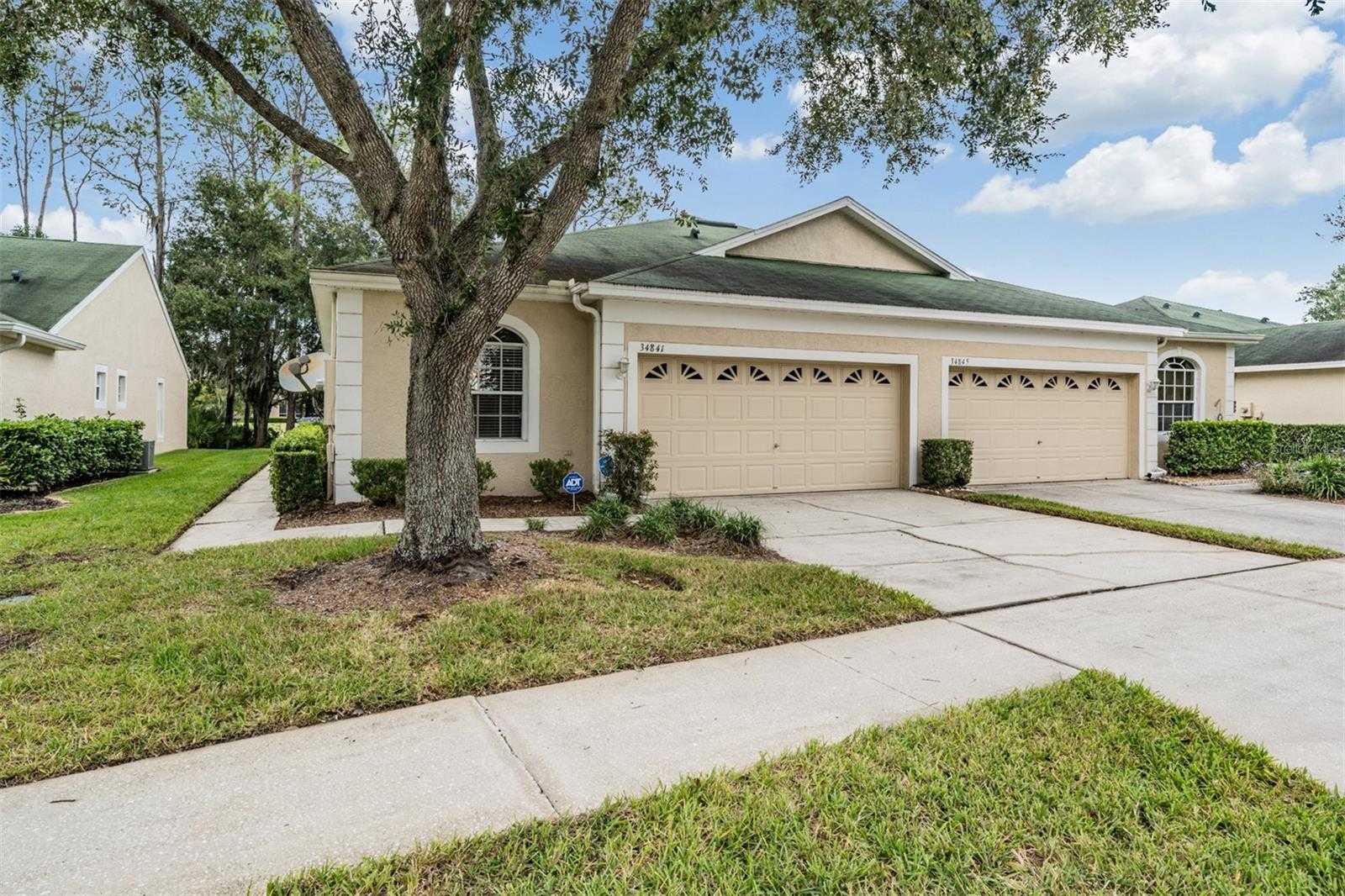 photo 1: 34841 DOUBLE EAGLE COURT, ZEPHYRHILLS FL 33541