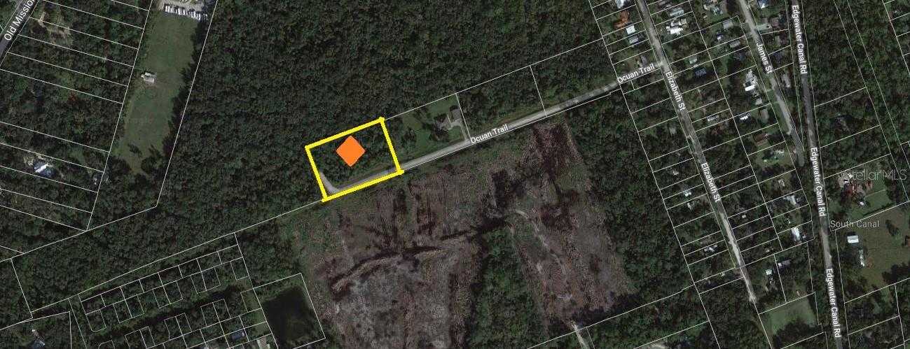 photo 1: 1587 Ocuan ROAD, NEW SMYRNA BEACH FL 32168