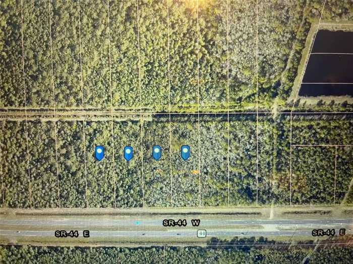 photo 1: 3491 State Rd 44 ROAD, NEW SMYRNA BEACH FL 32168