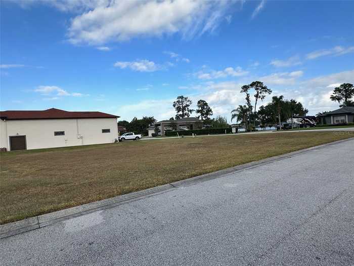 photo 2: 717 MEANDERING WAY, POLK CITY FL 33868