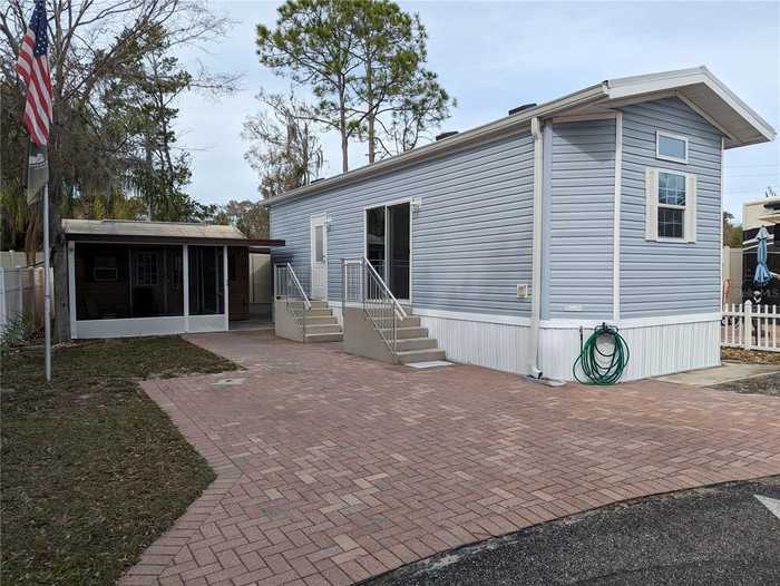 photo 1: 20300 LEONARD ROAD Unit 2, LUTZ FL 33558