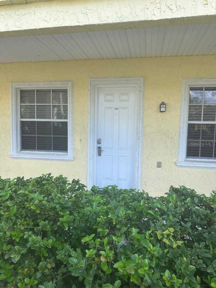 photo 1: 21032 PICASSO COURT Unit K 103, LAND O LAKES FL 34637