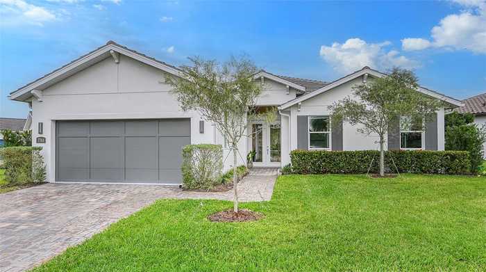 photo 1: 7744 SANDHILL LAKE DRIVE, SARASOTA FL 34241