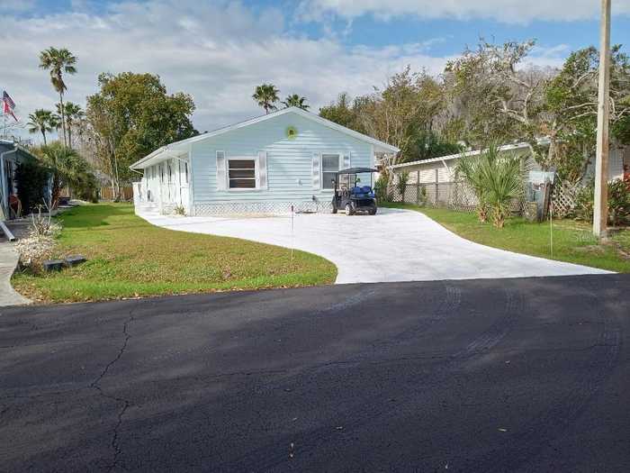 photo 1: 20968 LITTLE MAGENS LOOP, LUTZ FL 33558