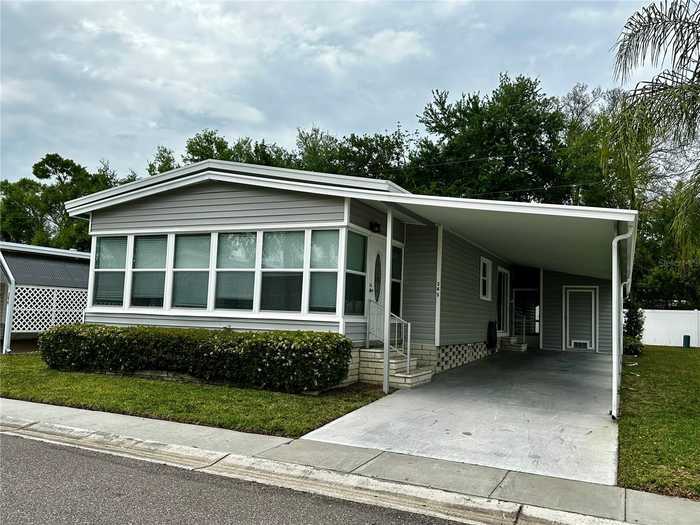 photo 1: 1100 BELCHER ROAD S Unit 345, LARGO FL 33771