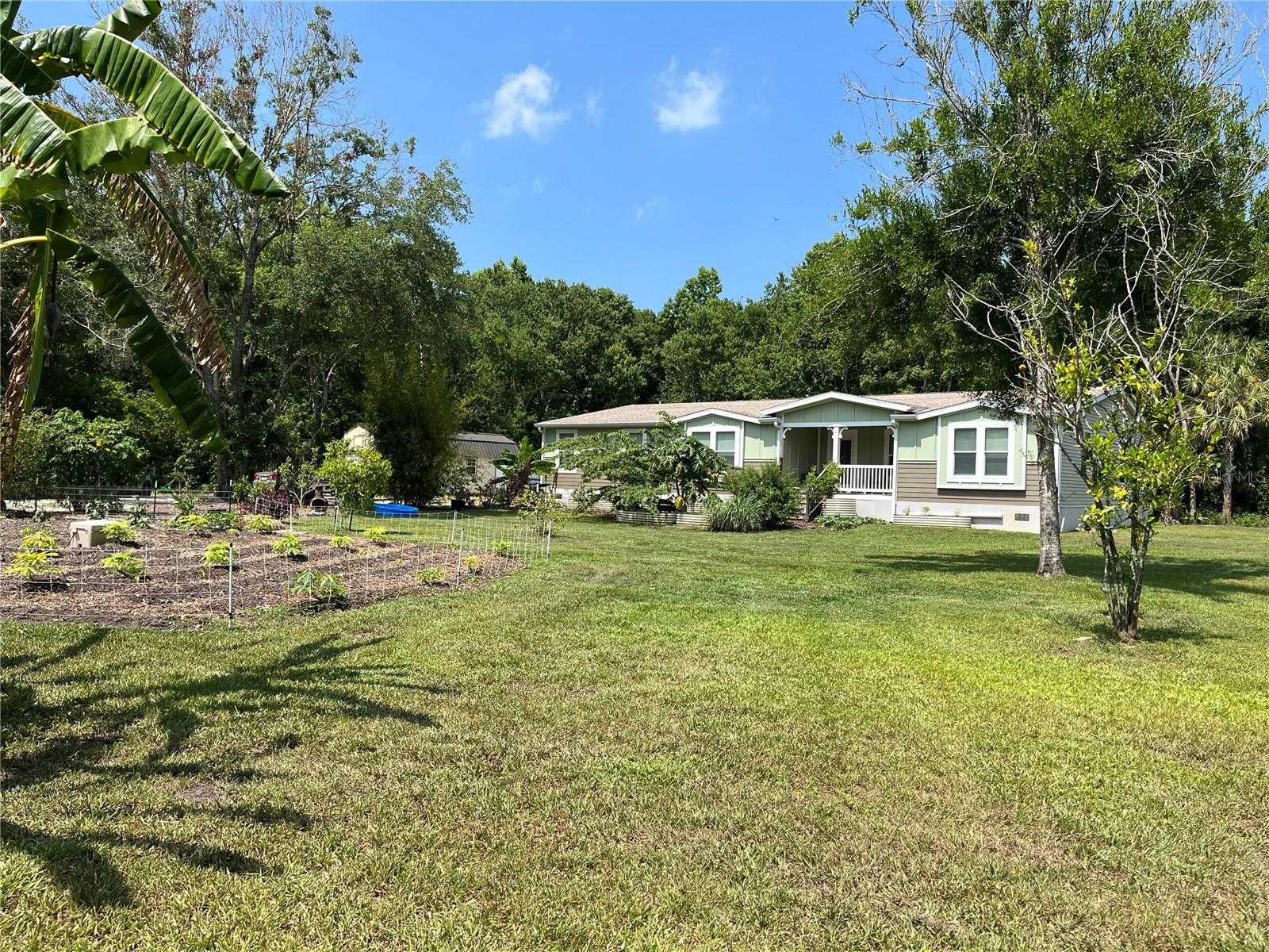 photo 2: 227 N PUTNAM GROVE ROAD, OAK HILL FL 32759