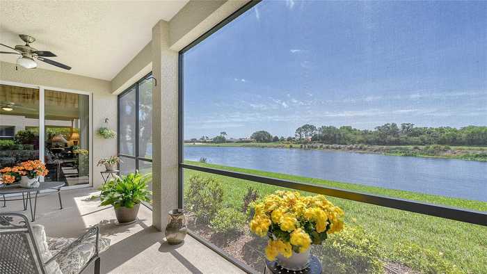 photo 1: 8004 GRAND ESTUARY TRAIL Unit 104, BRADENTON FL 34212