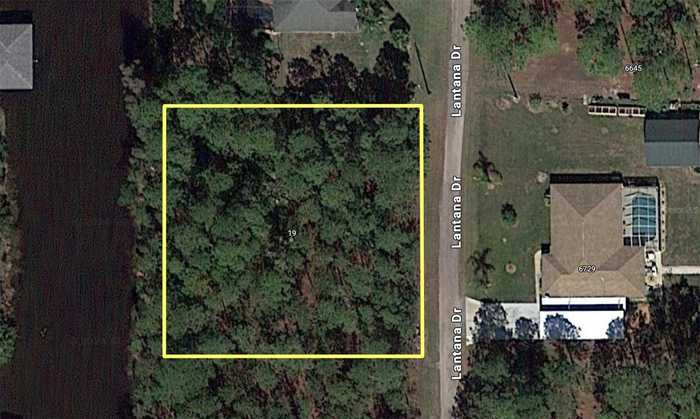 photo 1: 19 LANTANA DRIVE S, INDIAN LAKE ESTATES FL 33855