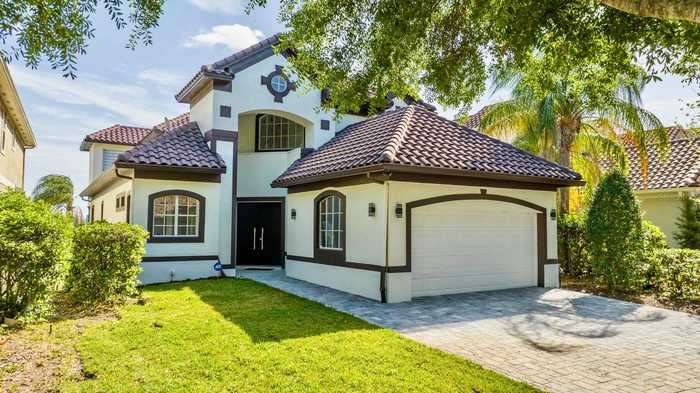 photo 1: 8519 SAINT MARINO BOULEVARD, ORLANDO FL 32836