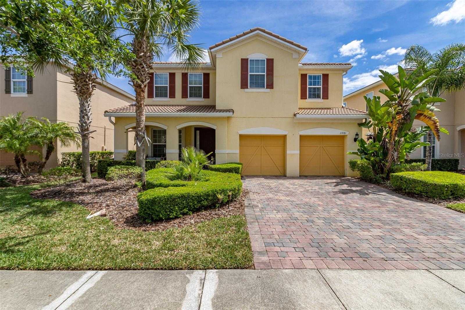 photo 1: 11981 AUTUMN FERN LANE, ORLANDO FL 32827