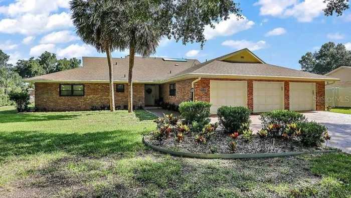 photo 1: 9729 WEDGEWOOD LANE, LEESBURG FL 34788