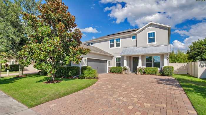 photo 1: 14799 GOLDEN SUNBURST AVENUE, ORLANDO FL 32827