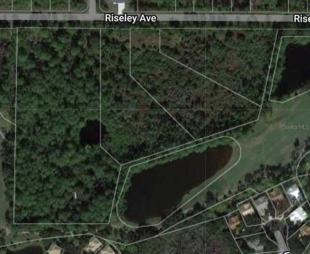 photo 2: 14215 RISELEY AVENUE, PORT CHARLOTTE FL 33953