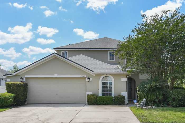 photo 1: 13545 GUILDHALL CIRCLE, ORLANDO FL 32828