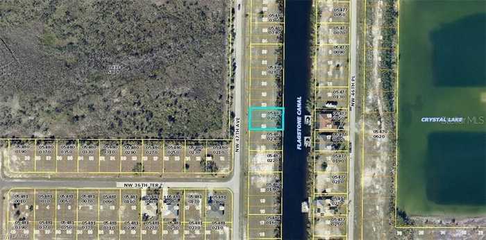 photo 1: 3627 NW 47TH AVENUE, CAPE CORAL FL 33993