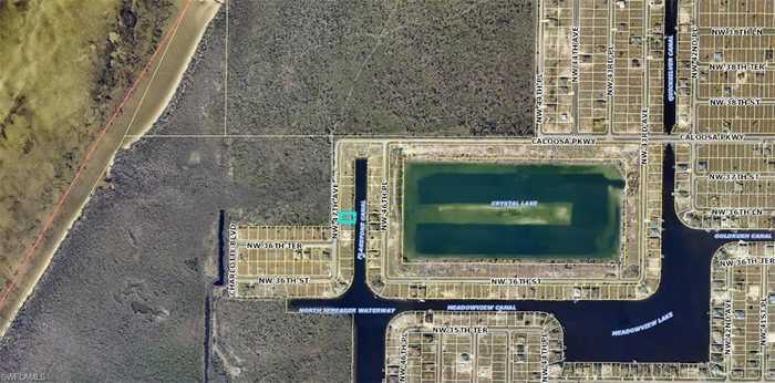 photo 2: 3627 NW 47TH AVENUE, CAPE CORAL FL 33993