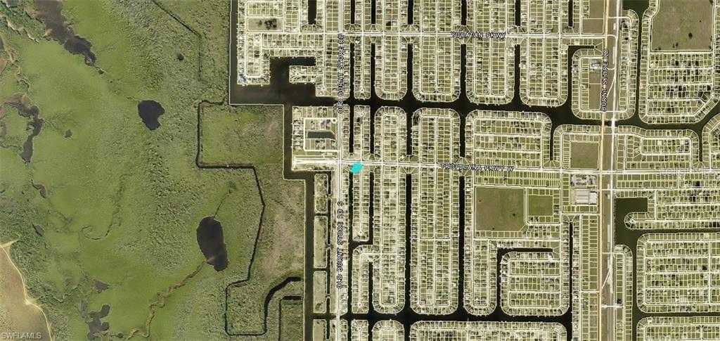 photo 3: 738 NW 39TH AVENUE, CAPE CORAL FL 33993