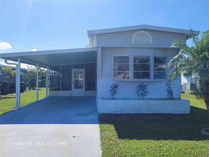 photo 1: 3035 MIMOSA WAY, LAKELAND FL 33801