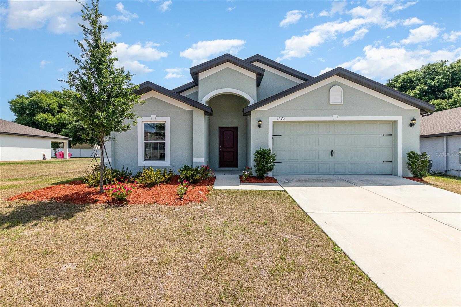 photo 1: 1672 GOPHER TREE STREET, MASCOTTE FL 34753